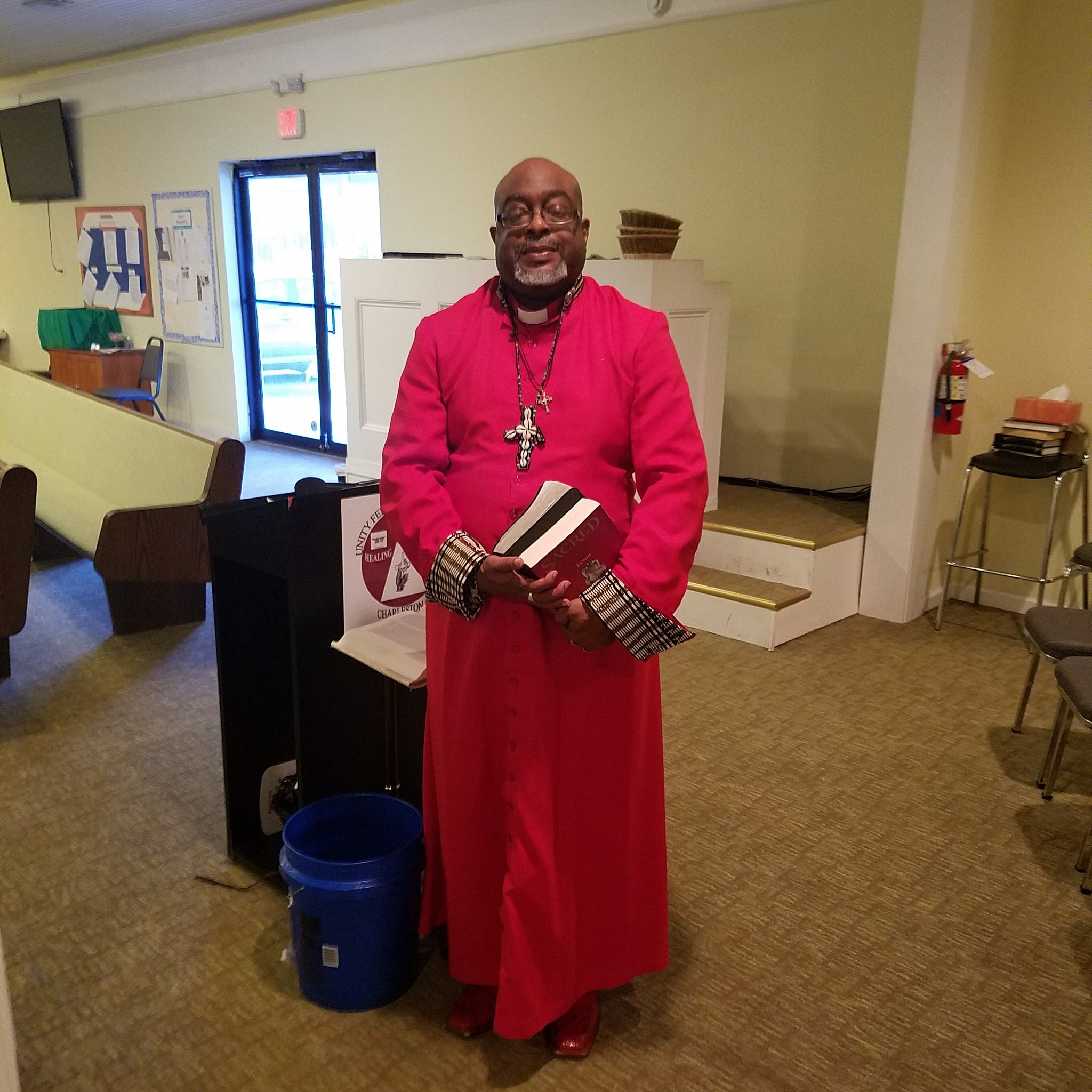 Reverend Robert Arrington completely robed up in the red robe, 2018. Photo courtesy of Robert Arrington.