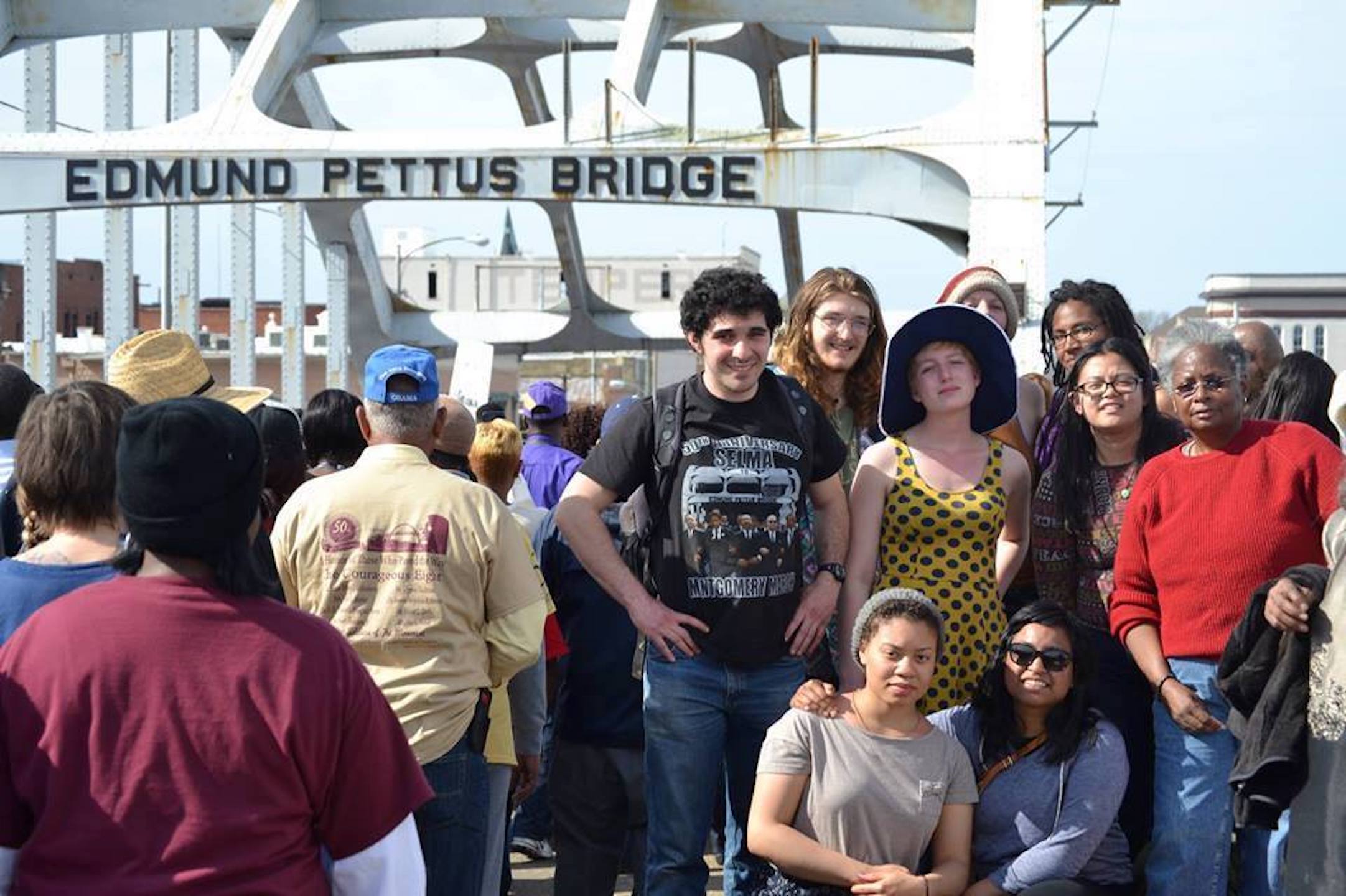 Mandy with students from Warren Wilson College, NC on the Edmund Pettus Bridge, March 2015. Mandy shares, “This marked the 50th Anniversary of the 1965 Selma-to-Montgomery Voting Right March. President Barack Obama and the First Family were in attendance with the late Representative John Lewis.” Photo courtesy of Mandy Carter.