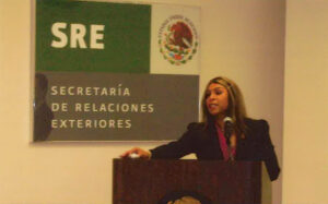 3.	Elia Chinó delivers a speech at the Consulate General of Mexico in Houston, Texas, 2006. Photo courtesy of Elia Chinó.