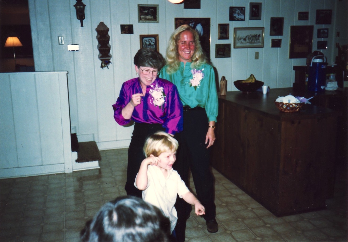 Jennifer Crossen, Joan Callahan (her partner), and David Crossen (her son) at their commitment ceremony, which was officiated at their house in Lexington, KY, 1989. The minister was from the Unitarian Church.