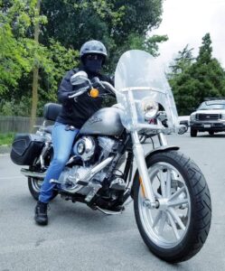 Rosa Diaz on her Harley Davidson Dyna Super Glide motorcycle, as a member of the Blue Knights Law Enforcement International Motorcycle Club. She shares, “I’ve been riding motorcycles since 2009. Our club provides scholarships to career-minded students interested in local law enforcement.” Photo courtesy of Rosa Diaz.