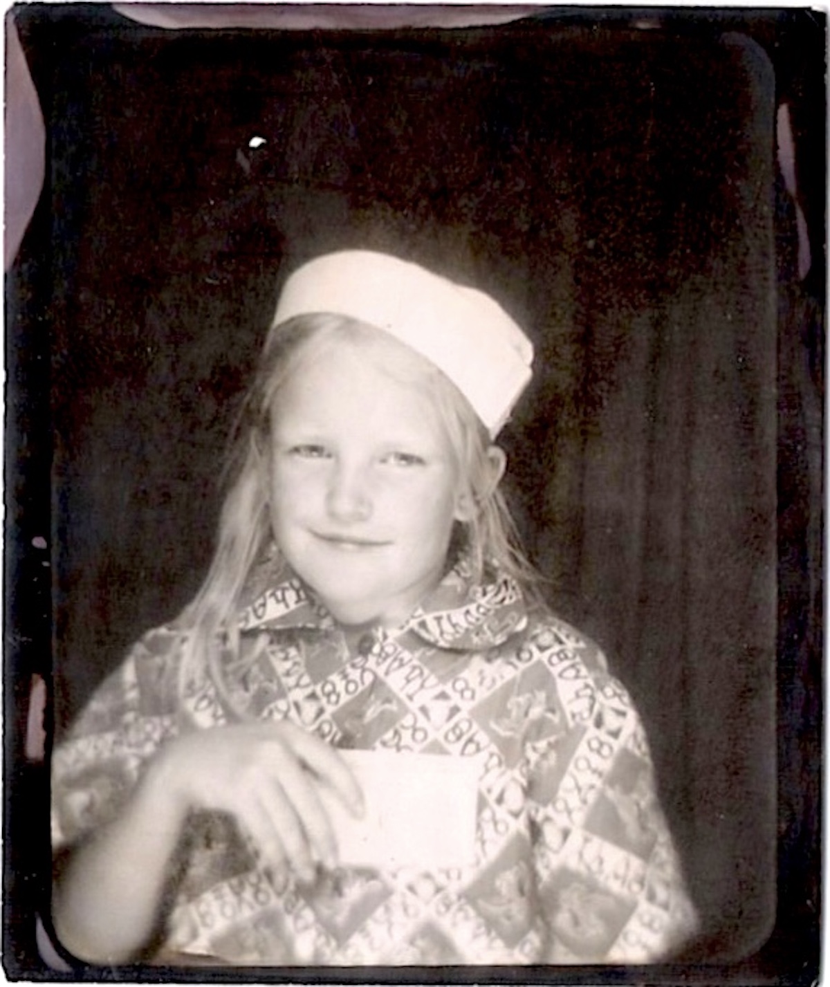 Susan at age 10 in a sailor hat. Photo courtesy of Susan Griffin.
