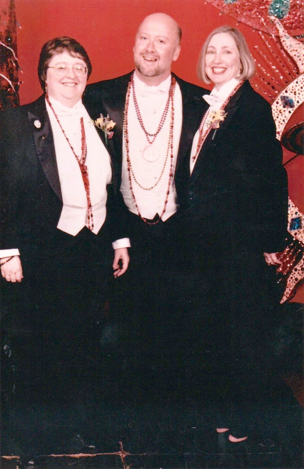 Kathie Hiers, Steve Mozino (who died in 2007), and Donna Bark at the Osiris Mardi Gras Ball, 1996. Photo courtesy of Kathie Hiers.