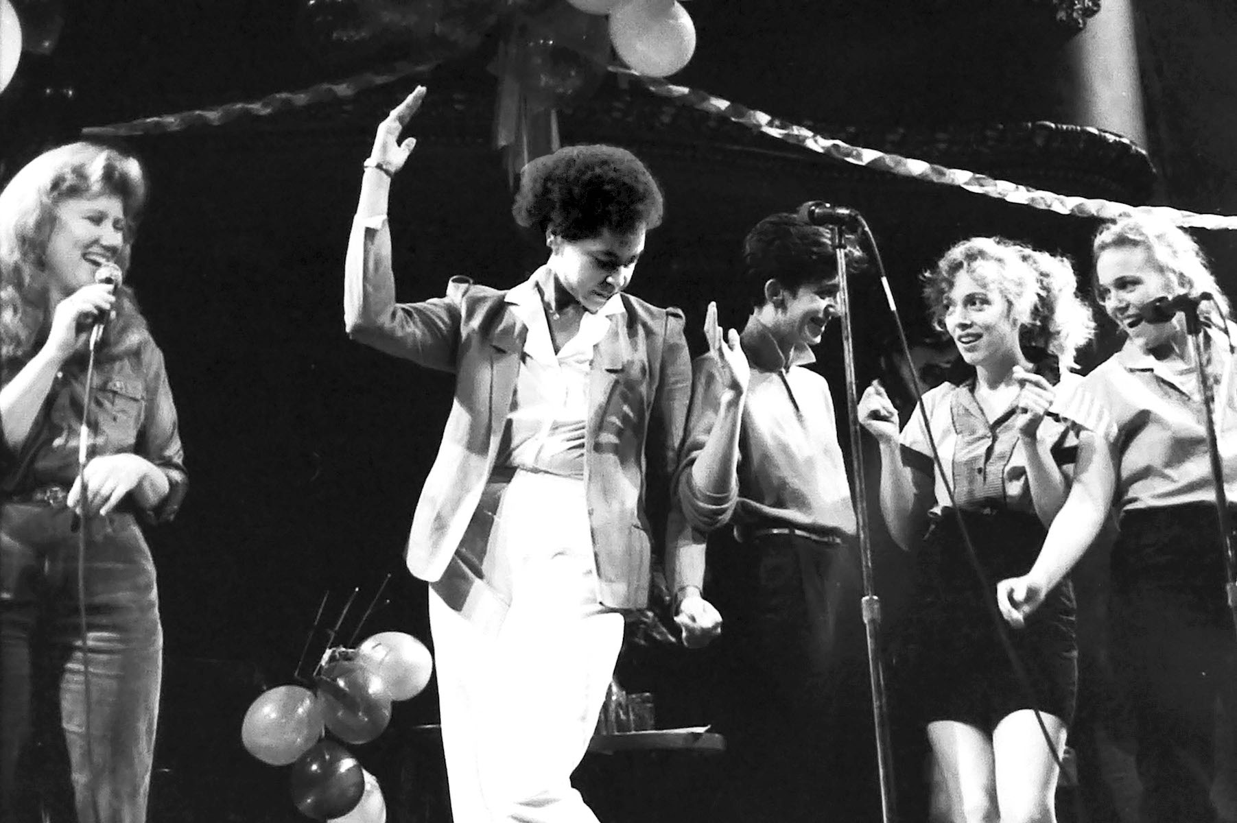 Holly Near, Linda Tillery, Adrian Torf, Barbra Higby, and Teresa Trull performing at the Great American Music Hall, San Francisco, CA, 1984. Photo Credit: J.A. Rubino. Photo courtesy of Holly Near.