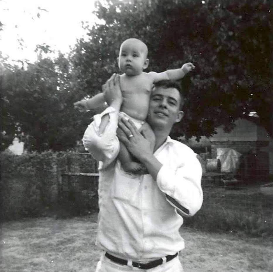 Shanna and her father Mike Foust in the backyard of their first house, Borger, TX, 1965. Photo courtesy of Shanna Peeples.