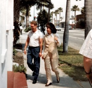Jane Pauley and Steve Pieters entering the front door of MCC Los Angeles for a profile segment on her primetime show, “Real Life with Jane Pauley,” June, 1991.