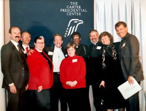 Steve Pieters with the MCC delegation at the Carter Center/Presidential Library in Atlanta, GA, 1989, when many Protestant denominations came together to sign “The Atlanta Declaration,” a progressive, liberal statement on AIDS. This MCC delegation included the Rev. Elders Jeri Ann Harvey, Troy Perry, Freda Smith, and several MCC pastors. 