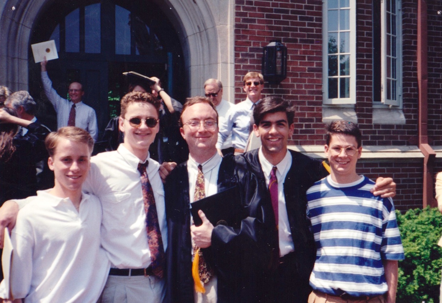 (L-R) Paul Feeney, David Van Dalfsen, Andy Dailey, Matthew Parsons, and Jim Bridges. K.C. shares, “These were some of the students meeting at West Side Row in my residence. I snapped a photo after graduation.” 