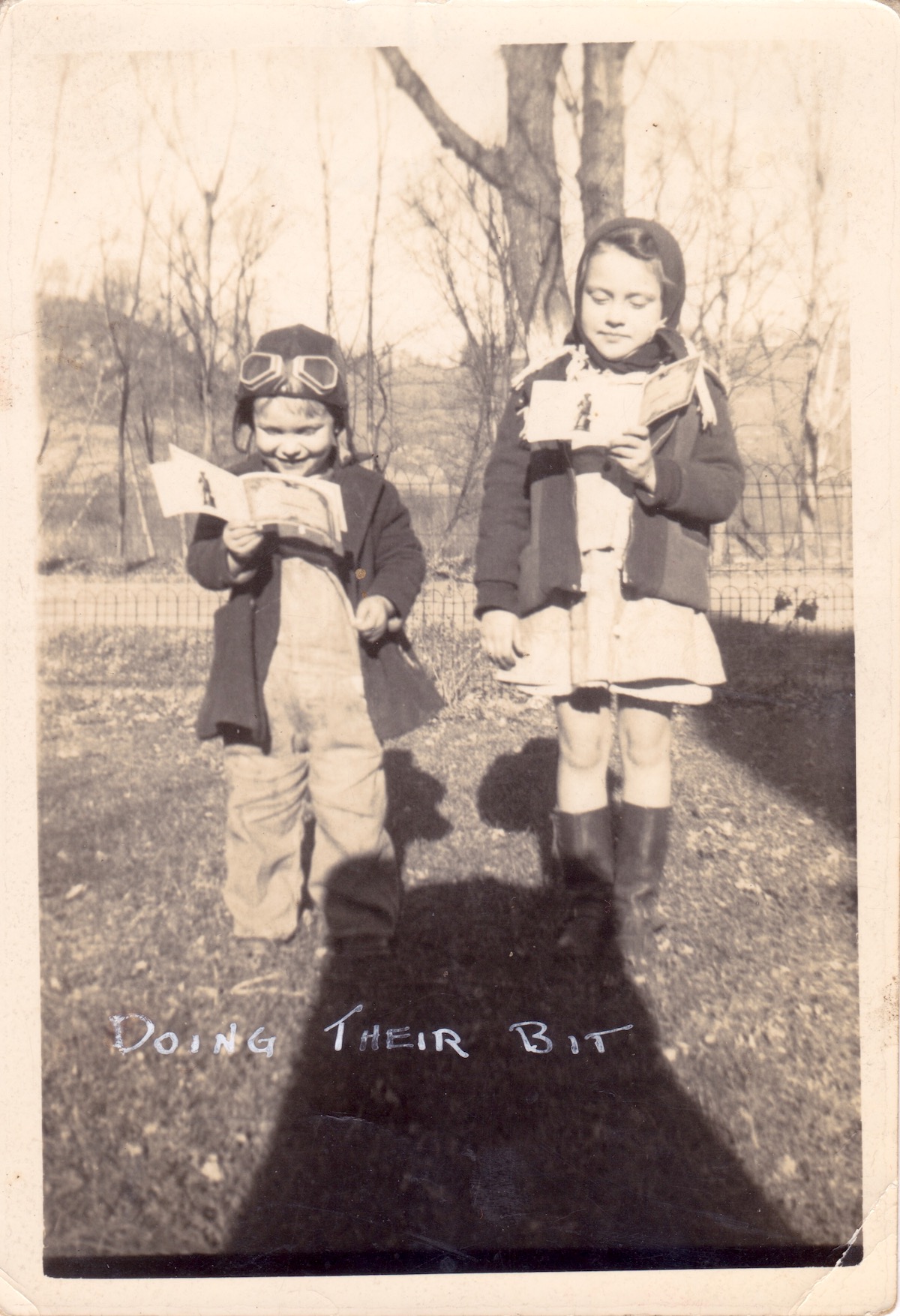 K.C. Potter and Ann Potter (sister) with their war ration stamps during WWII at their home, Fallsburg, KY.