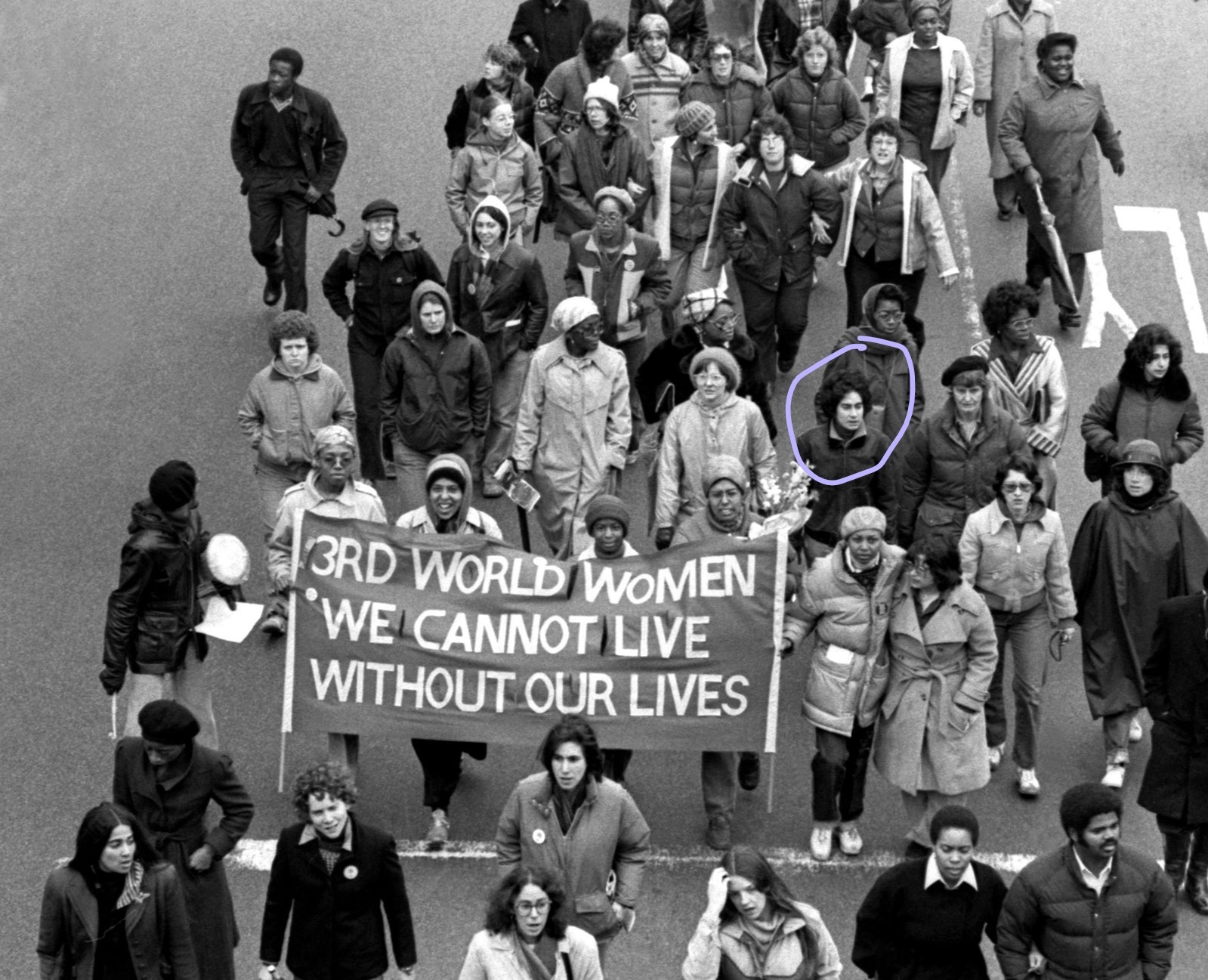 Cheryl Qamar marching with the Combahee River Collective to memorialize the deaths of Black women who had been murdered in the Boston area, 1979. Their banner reads, “3rd World Women: We Cannot Live Without Our Lives.” Photo Credit: the Combahee River Collective Archives. Photo courtesy of Cheryl Qamar.