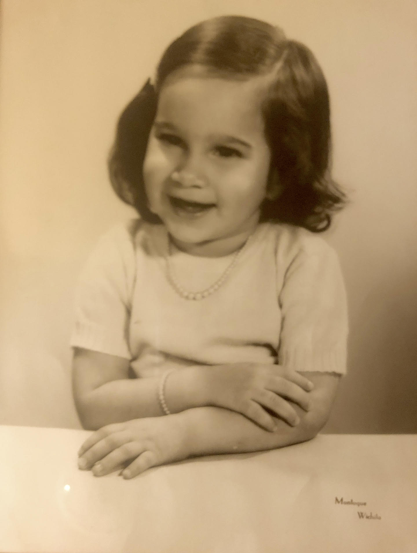 Cheryl Qamar at age 2. She says, “notice the pearls!” Photo courtesy of Cheryl Qamar.