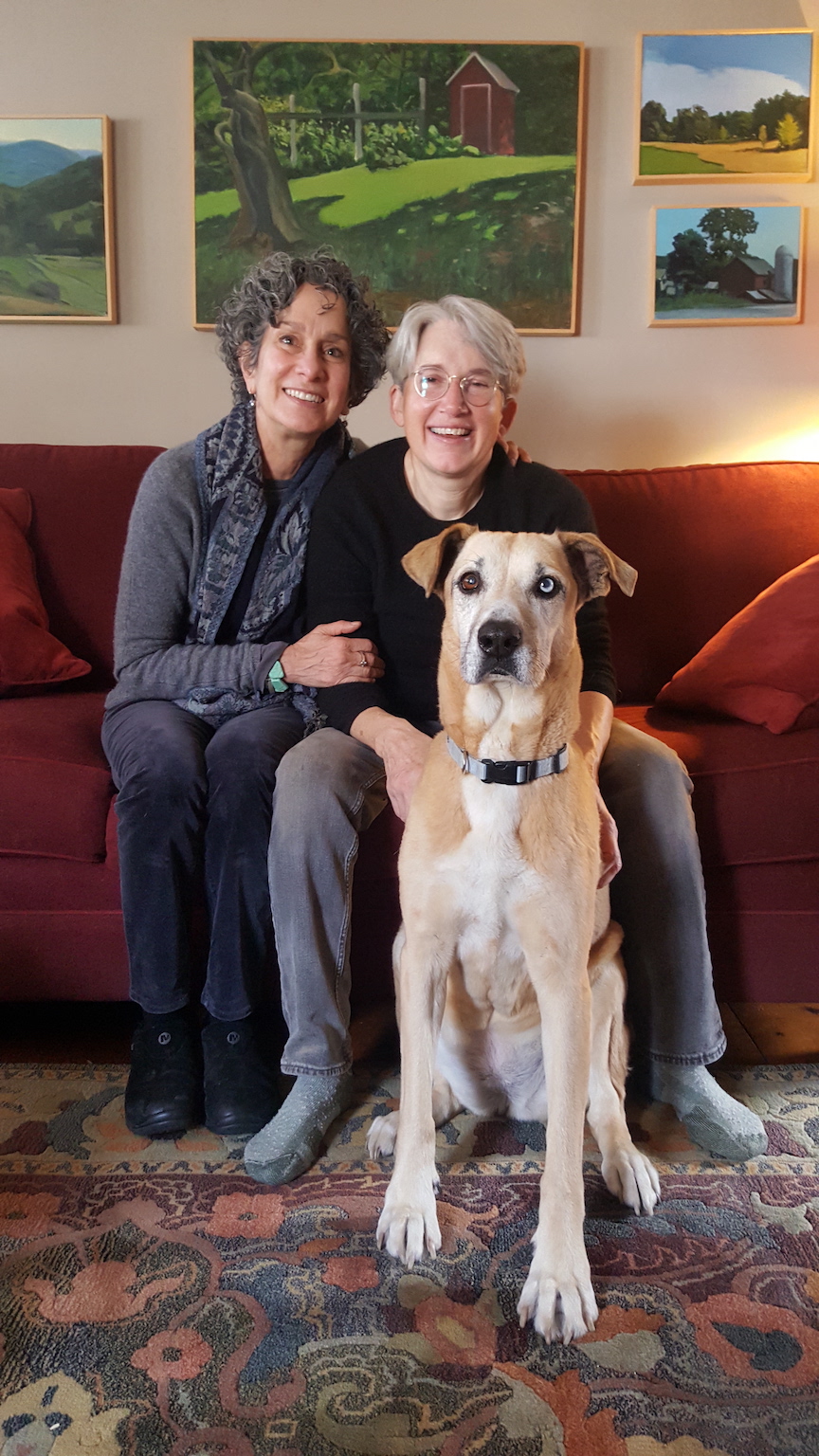 A family portrait of Cheryl, Cris, and their dog. Photo courtesy of Cheryl Qamar. 