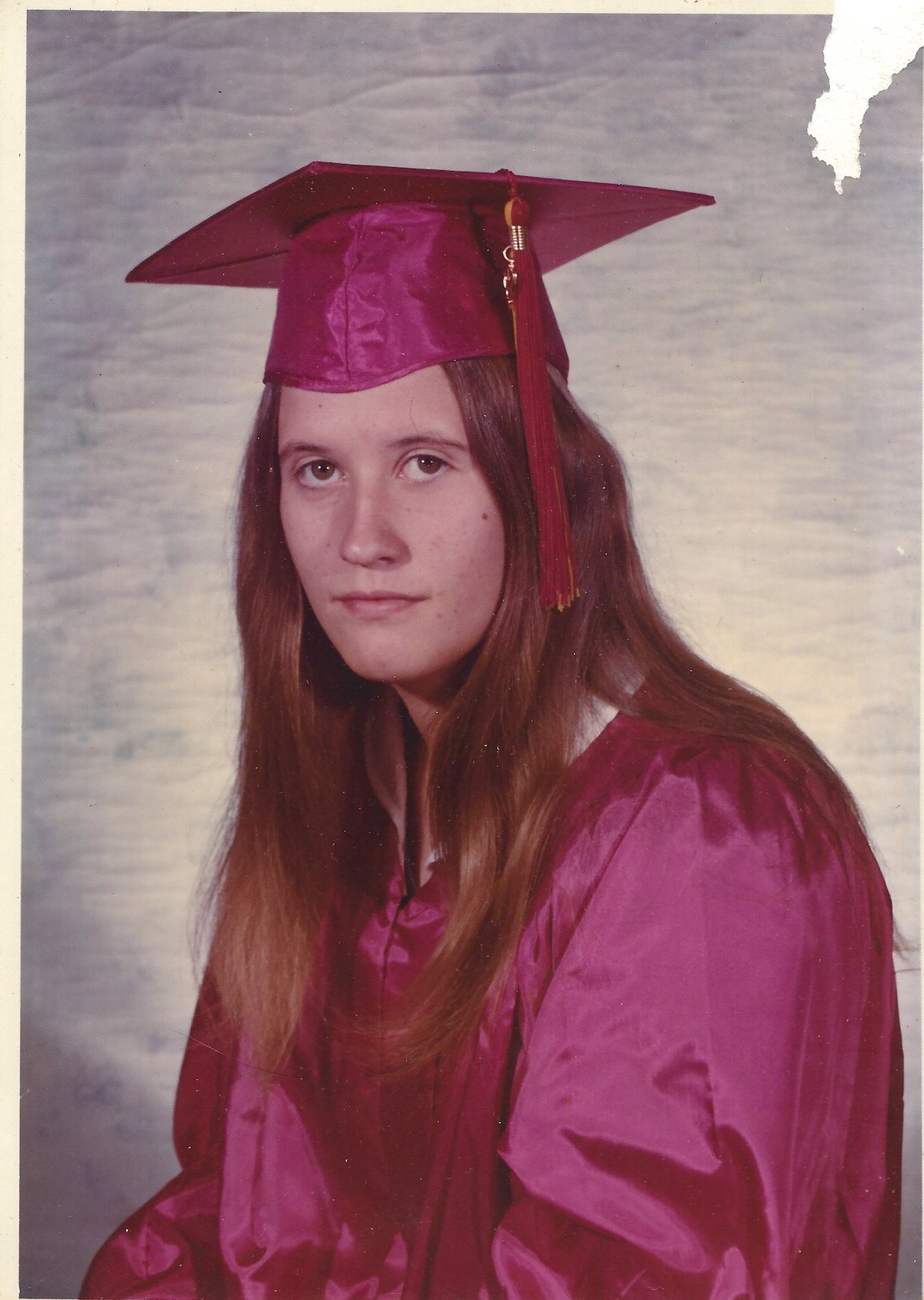 A high school graduation portrait of Kim Stacy (age 18), Hyden, KY, 1975.