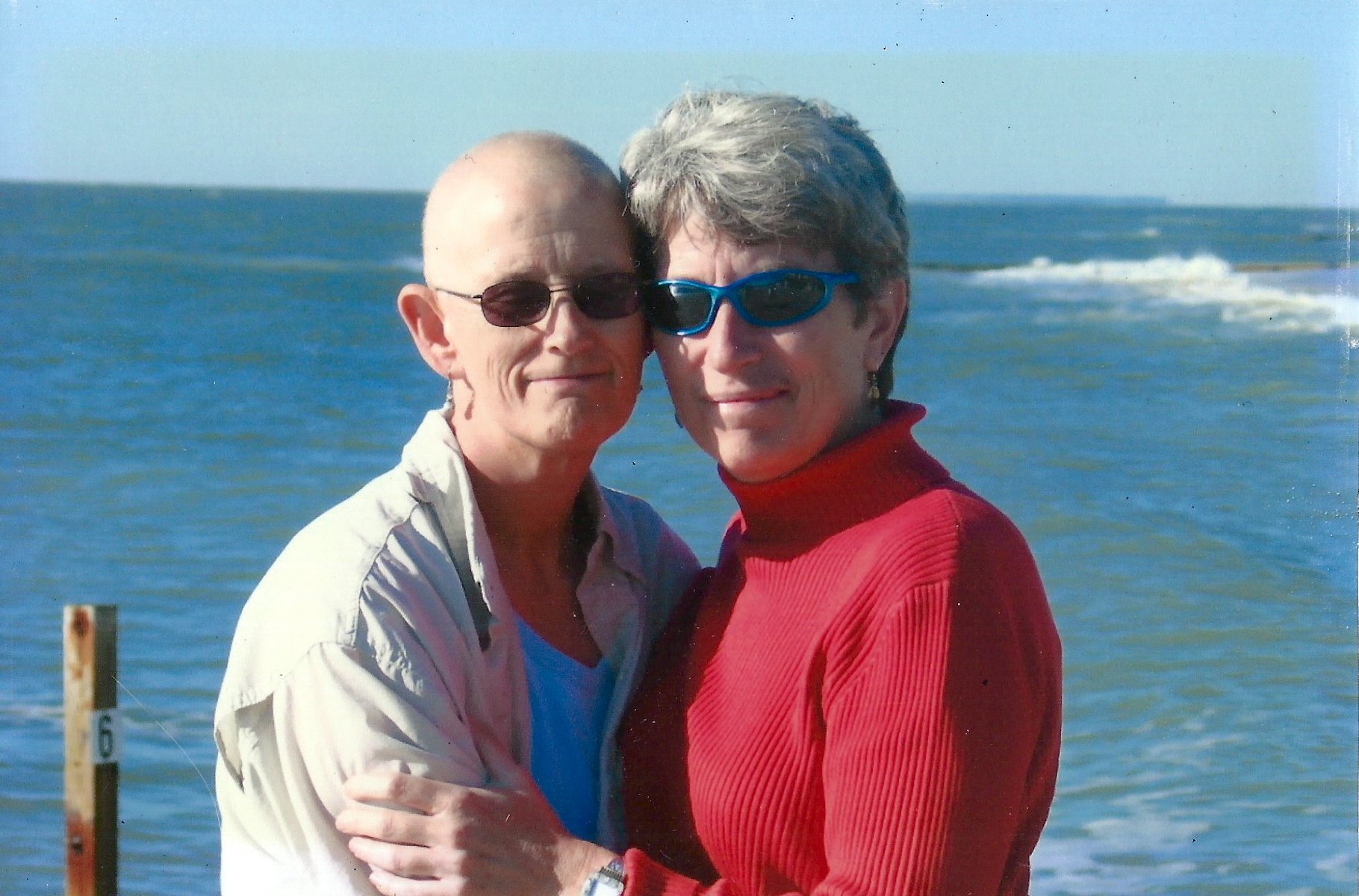 Kim Stacy, post-chemo treatment for breast cancer, with her future wife Anne Harrison, Edisto Beach, SC, 2005. 