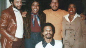 Jewel smiling with friends, late 1970s. L-R: unknown, Jewel’s sister Carole, Avery (Jewel’s spiritual brother), Jewel; front: Henry. Photo courtesy of Jewel Thais-Williams.