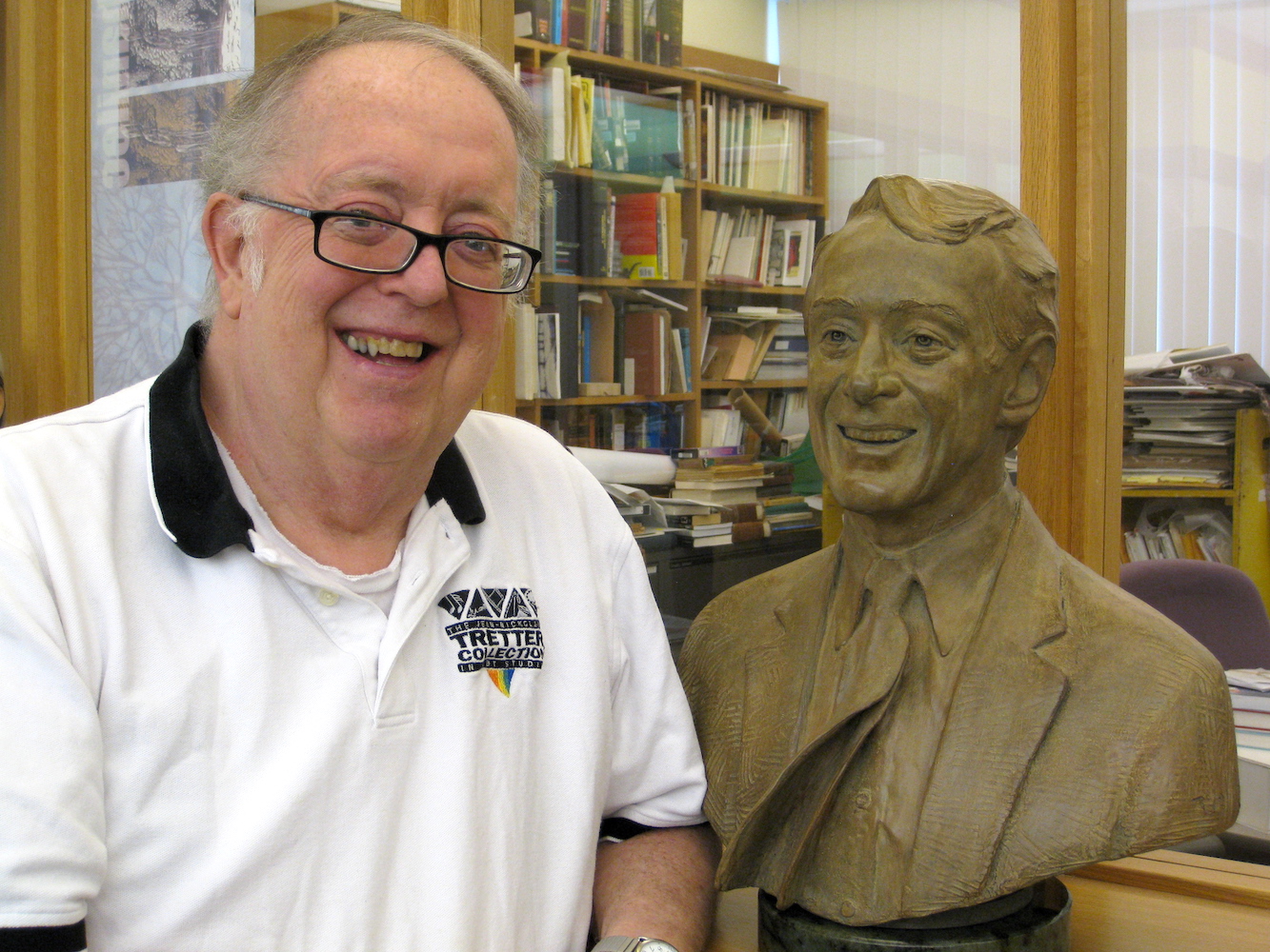 Jean-Nickolaus Tretter with a bust of Harvey Milk. Photo courtesy of Jean Tretter.