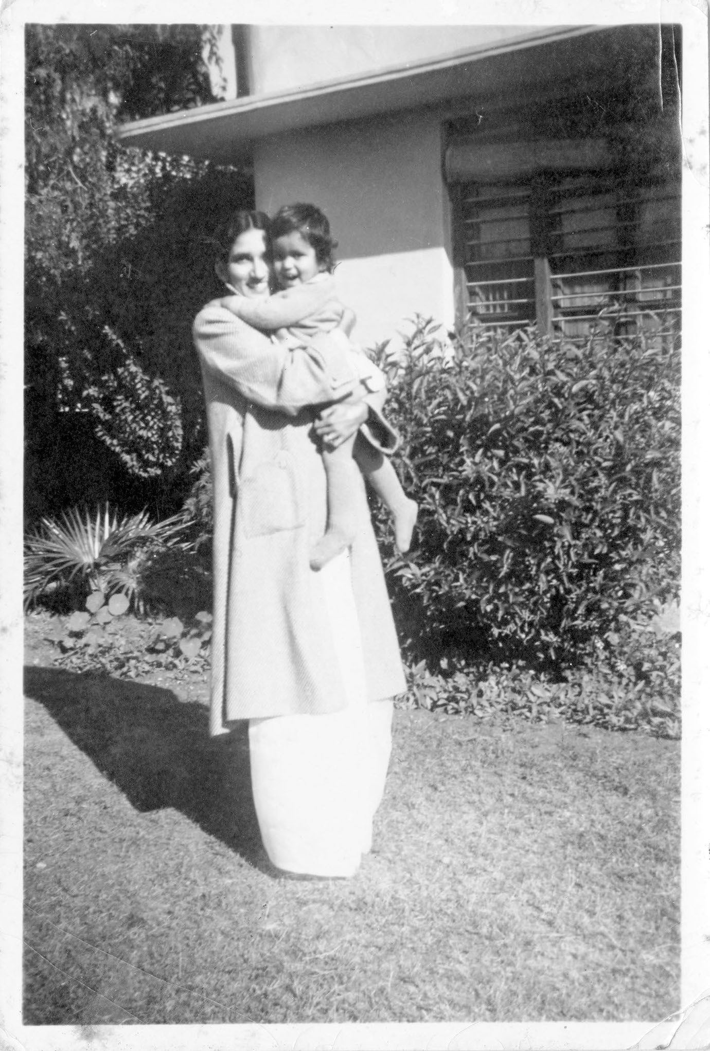 Ruth (age 2) with her mother in her grandfather’s house, Rangoon Villa’s garden, Patel Nagar, New Delhi. Photo courtesy of Ruth Vanita.