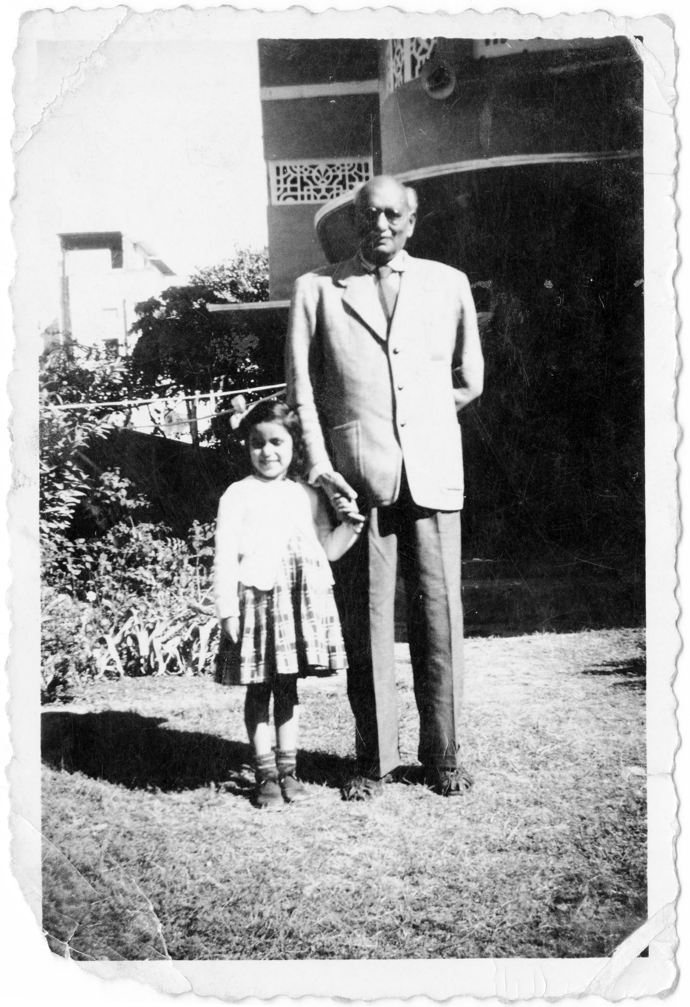 Ruth (age 5) with Uncle Charlie, Rangoon Villa’s garden, Patel Nagar, New Delhi. Photo courtesy of Ruth Vanita.