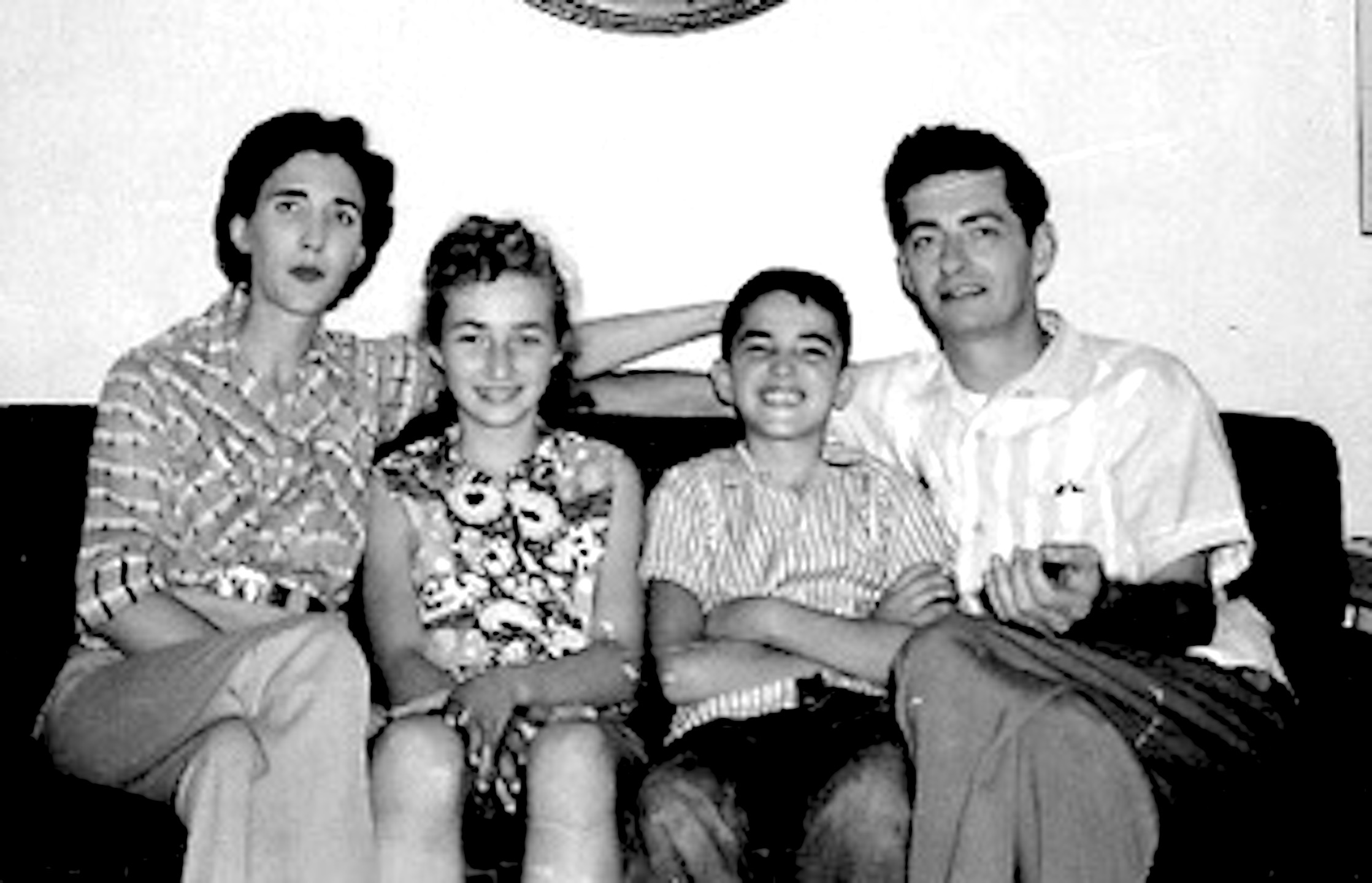 Ron with his mother, sister, and father.	