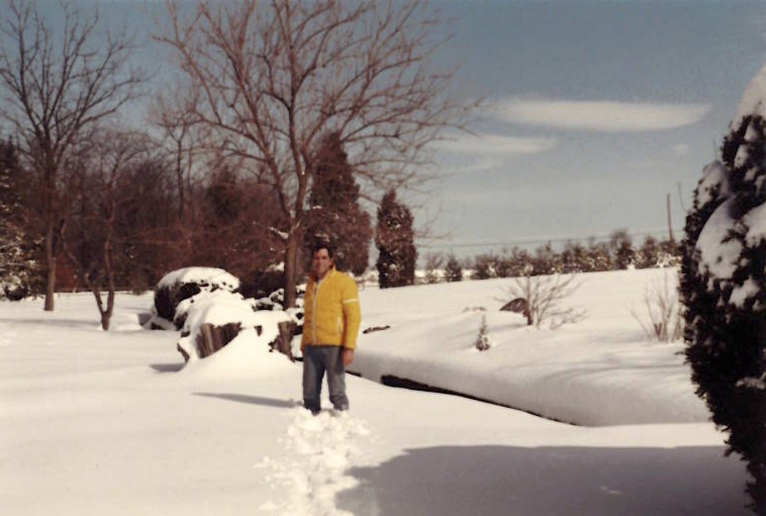 Chuck in the snow by his house at Fox Path Farm, Pennsylvania, 1983.
