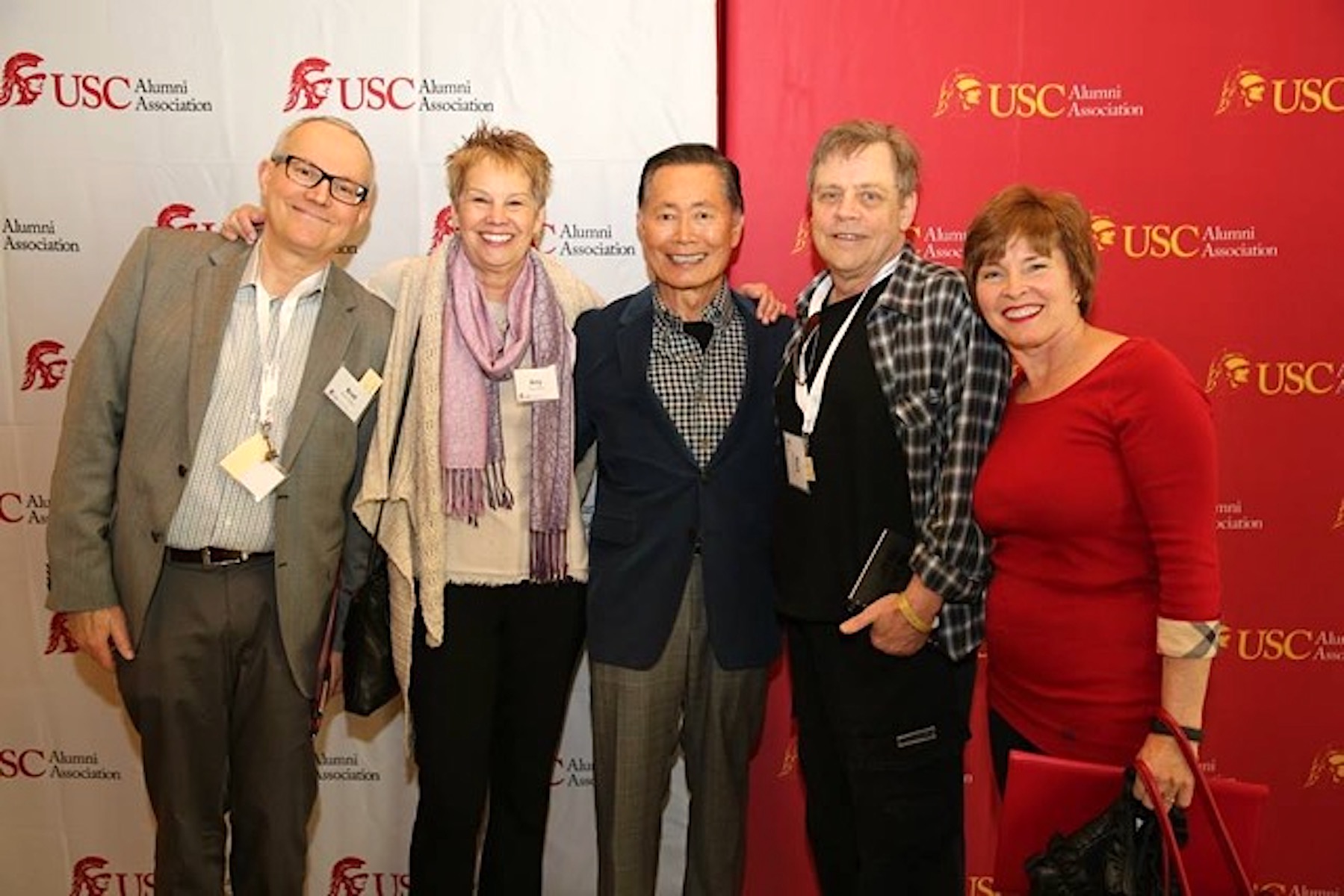 Amy Ross with her friends and festival supporters George Takei and Mark Hamill at the USC Lambda/Don Thompson Film Festival, 2014, Los Angeles, CA. Amy shares, “In 1992, I joined fellow USC LGBTQ alumni to establish the USC Lambda Alumni Association.  It was one of the first queer alumni groups at a major university. I was especially proud to establish the USC Lambda/Don Thompson Film Festival which features the films of USC’s School of Cinematic Arts student group “Queer Cut.” Over the years, we have raised a significant amount of money for scholarships for LGBTQ and ally students.”