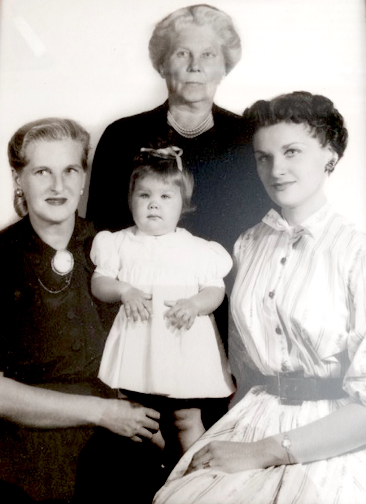 Amy Ross, her great grandmother, her maternal grandmother, and her mother at Amy’s first birthday celebration, April 1954. She credits them as “very strong influences in [her] life.”