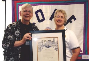 Arden Eversmeyer honored at the Lesbians Over the Age of Fifty (L.O.A.F) 25th Anniversary celebration with Mayor Annise Parker, 2012.