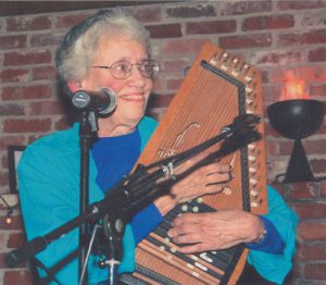 BobBI Keppel performs the autoharp at Ferry Beach Conference Center, August 25, 2005, Saco, ME. The autoharp was the first Christmas gift BobBI ever received from husband Bob Keppel.