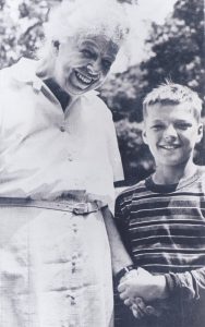 First Lady Eleanor Roosevelt, and Cliff Arnesen (Age 12) at her Hyde Park estate during her annual picnic for the 100 boys of Wiltwyck School for Boys in Esopus, NY, 1959.