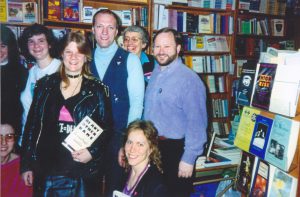 L-R back: Rebecca Schuster, Amanda Udis-Kessler, Cliff Arnesen, Bobbi Keppel, Wayne Bryant; L-R front: Rebecca Gorlin, Liz Highleyman, Robyn Ochs appear at the “Bi Any Other Name” book signing by authors at the Glad Day Book Store in Boston, MA, on April 20, 1991.