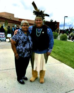 Crisosto Apache with mother, Evangelina G. Apache, at his Masters of Fine Arts graduation at the Institute of American Indian Arts (IAIA), May 2015, in Santa Fe, New Mexico. Crisosto is the only member of his family to earn a graduate degree.