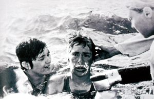 Diana Nyad assisted by head handler, Margie Carroll, 1978. After 41 hours, 49 minutes, she stopped short of reaching her destination. Courtesy of Diana Nyad.