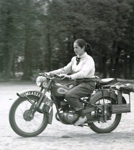 Diana motorcycling through France, 1951.