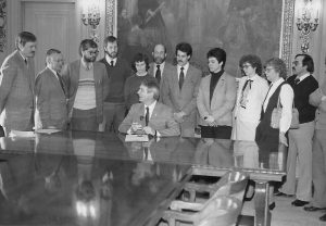 Dick Wagner (left) witnesses Gov. Earl signing an AIDS Awareness Proclamation in 1984 when President Reagan had not yet spoken on AIDS.