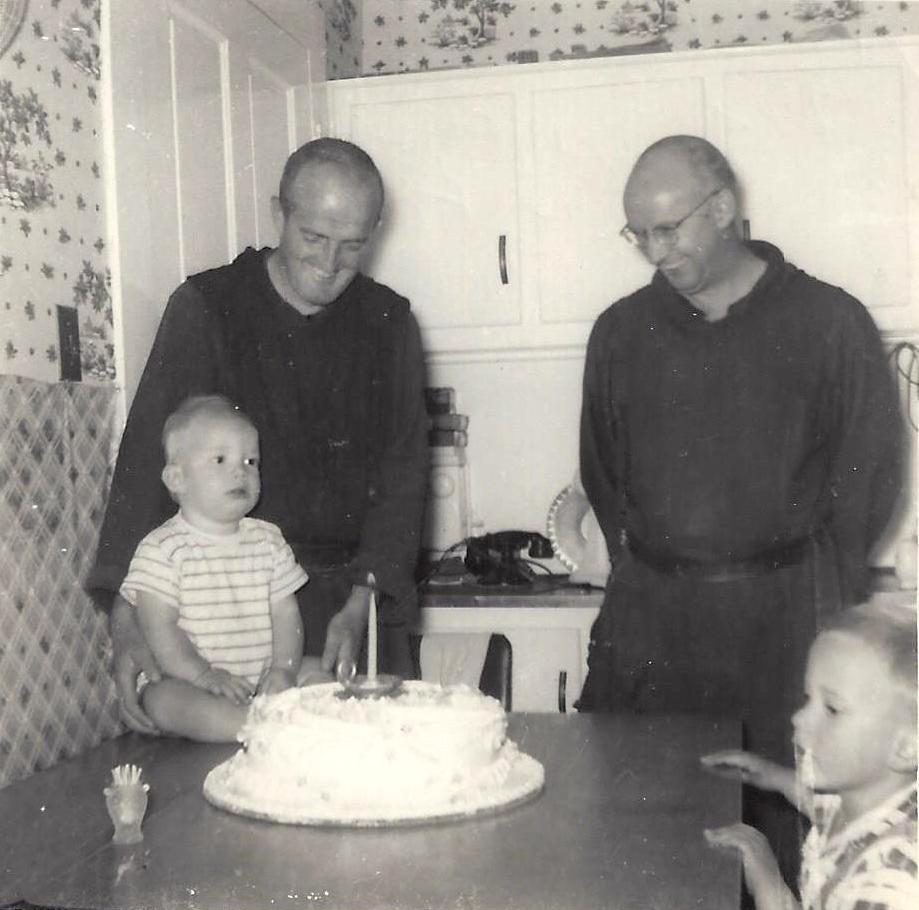 Fenton's first birthday cake was made by Brother Fintan, aka Edward Francis Dwyer, after whom Fenton Johnson was named -- his mother misspelled his name on the birth certificate. Brother Clement (John Dorsey, his other namesake) is on the left, Brother Fintan on the right.