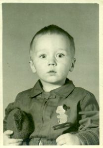 Franklin Abbott at the age of 2 with his teddy bear, 1952, Birmingham, Alabama.