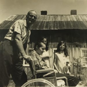 Hector bringing Susie home from two knee and one hip replacements, with their daughters Rose and Aggie, Rockmart, GA, 1968.