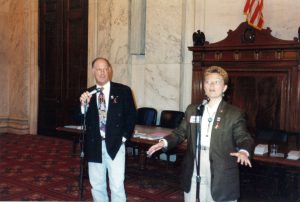 Rob Eichberg, Ph.D. with Honey Ward at the Experience graduates gathering at the Russell House Office Building during the March on Washington for Lesbian and Gay Rights, 1987, Washington, D.C.