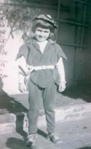 Jamison at eight-years-old in the Peter Pan outfit his mother made for him, 1957.