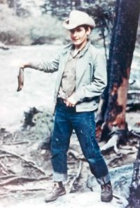 Jamison backpacking in Yosemite at age 14; trout proudly caught with a spool of leader and a mosquito fly, 1963.