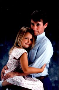 Jamison with his daughter, she’s about 6, and he’s 41.