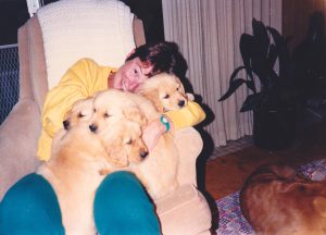Jan Edwards hugging her dogs, January 1987.