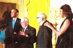 Patrick Bova (second from left) and Jim Darby (second from right) introduce U.S. President Barack Obama and First Lady Michelle Obama at the White House Reception Pride Reception, June 2014, Washington, D.C.