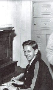 Jim playing piano as an 8th grader. Photo courtesy of Jim Gribben.