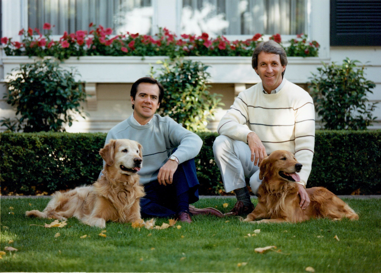 John and Jim at Eastmoreland House with their dogs Jason and Jeremy, 1983. 