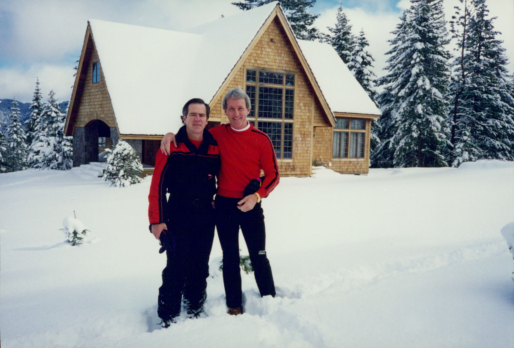 John and Jim outside the snow-covered cabin, 1994.