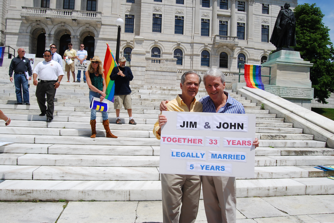 John and Jim at the Marriage Rally, Rhode Island, June 2009. Their sign reads, “Jim & John, Together 33 Years, Legally Married 5 Years”.
