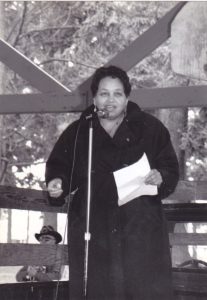 Kathleen speaks at a rally, mid-1990s.