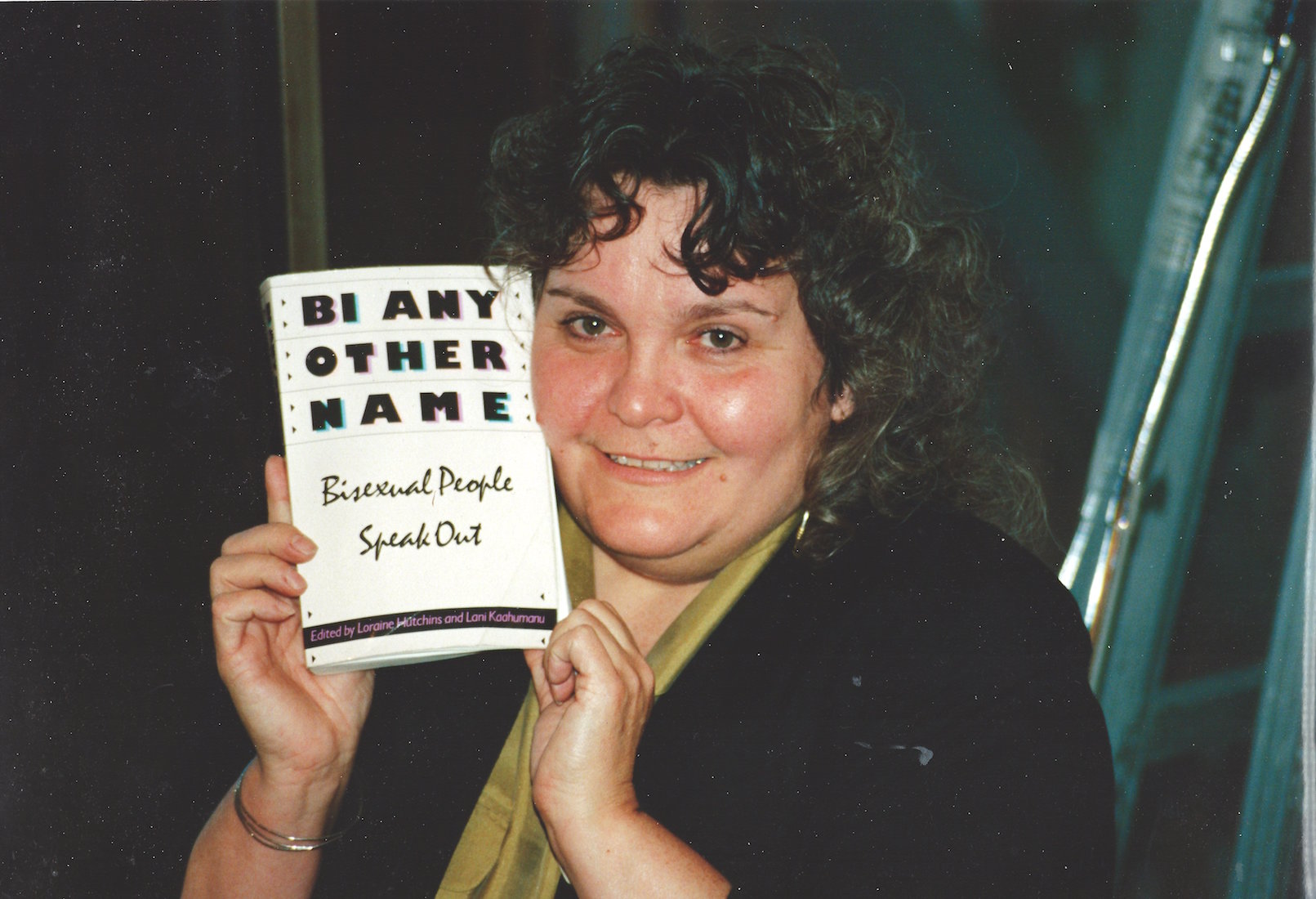 Lani at her first book reading for “Bi Any Other Name,” 1991. Photo credit: David Lourea.