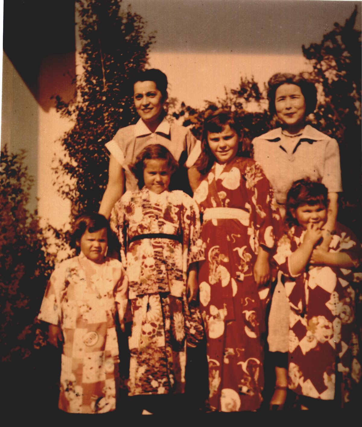Lani (“the tall one”) with her mother, Aunty Madge, and her sisters in kimonos — a gift from Madge, 1954.